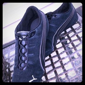 Black suede Puma sneakers
